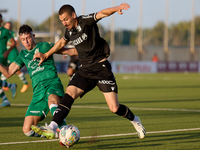 Joao Mendes (right) of Vitoria SC is being challenged by Alejandro Garzia (left) of Floriana during the UEFA Europa Conference League, Secon...