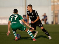 Joao Mendes (right) of Vitoria SC is being confronted by Alejandro Garzia (left) of Floriana during the UEFA Europa Conference League, Secon...