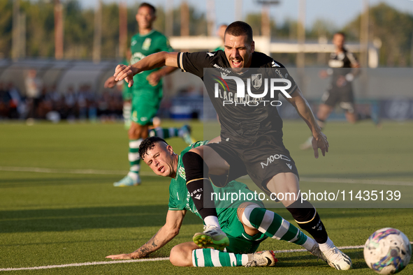 Joao Mendes (right) of Vitoria SC is being challenged by Alejandro Garzia (left) of Floriana during the UEFA Europa Conference League, Secon...