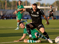 Joao Mendes (right) of Vitoria SC is being challenged by Alejandro Garzia (left) of Floriana during the UEFA Europa Conference League, Secon...