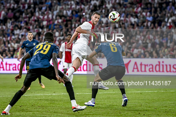 Ajax player Branco van den Boomen is scoring the 1-0 during the match Ajax - Vojvodina at the Johan Cruijff ArenA for the UEFA Europa League...