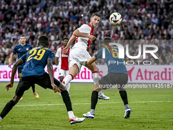 Ajax player Branco van den Boomen is scoring the 1-0 during the match Ajax - Vojvodina at the Johan Cruijff ArenA for the UEFA Europa League...