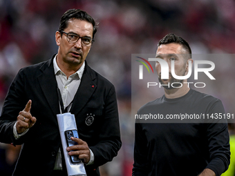 Miel Brinkhuis of Ajax and Ajax trainer Francesco Farioli are playing during the match Ajax vs. Vojvodina at the Johan Cruijff ArenA for the...