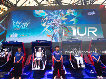 Fairgoers are trying out VR at the Snapdragon booth during the Chinajoy games fair in Shanghai, China, on July 26, 2024. (