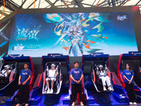 Fairgoers are trying out VR at the Snapdragon booth during the Chinajoy games fair in Shanghai, China, on July 26, 2024. (