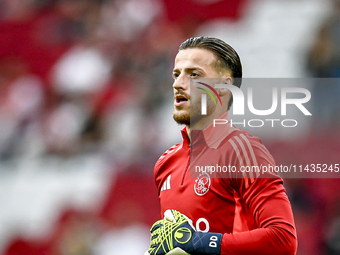 Ajax goalkeeper Diant Ramaj is playing during the match Ajax vs. Vojvodina at the Johan Cruijff ArenA for the UEFA Europa League Second qual...