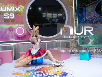 A model is being seen at the Fuji Lumix S9 booth during the Chinajoy games fair in Shanghai, China, on July 26, 2024. (