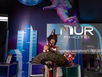 A model is being seen at the Canon booth during the Chinajoy games fair in Shanghai, China, on July 26, 2024. (