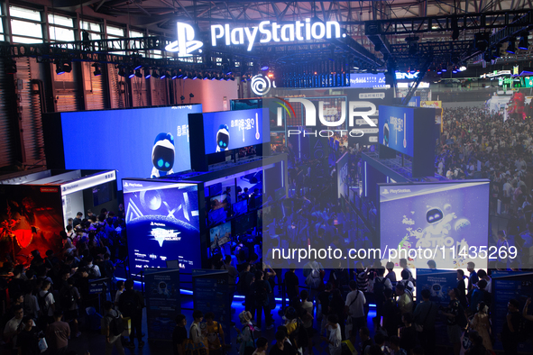 A general view of crowd fairgoers is showing them packed in front of the PlayStation booth during the Chinajoy games fair in Shanghai, China...