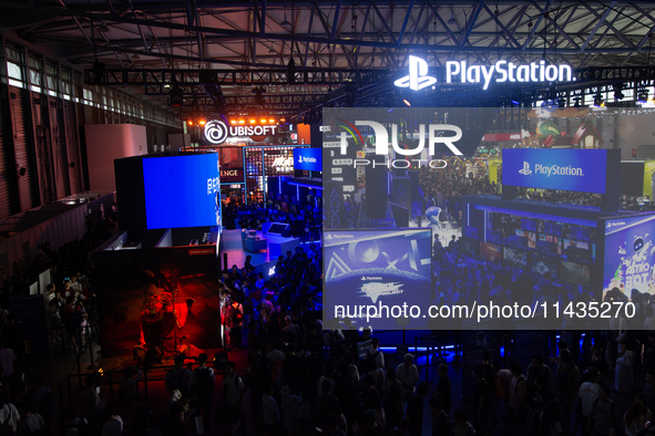 A general view of crowd fairgoers is showing them packed in front of the PlayStation booth during the Chinajoy games fair in Shanghai, China...