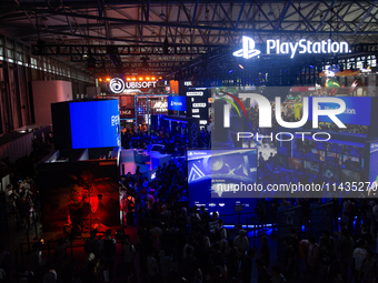 A general view of crowd fairgoers is showing them packed in front of the PlayStation booth during the Chinajoy games fair in Shanghai, China...