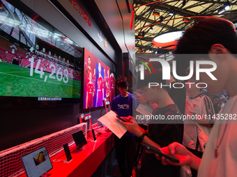 Fairgoers are visiting the Snapdragon semiconductor booth during the Chinajoy games fair in Shanghai, China, on July 26, 2024. (