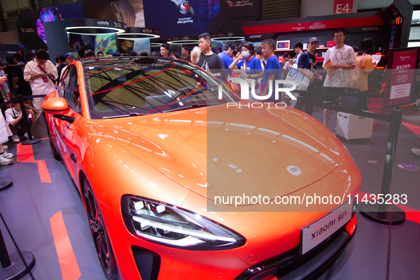 A Xiaomi Car is being seen at the Snapdragon semiconductor booth during the Chinajoy games fair in Shanghai, China, on July 26, 2024. 