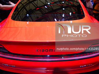 A Xiaomi Car is being seen at the Snapdragon semiconductor booth during the Chinajoy games fair in Shanghai, China, on July 26, 2024. (