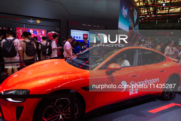 A Xiaomi Car is being seen at the Snapdragon semiconductor booth during the Chinajoy games fair in Shanghai, China, on July 26, 2024. 