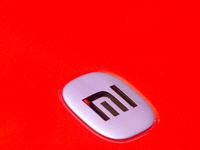 A general view of the Xiaomi logo is being seen from a car during the Chinajoy games fair in Shanghai, China, on July 26, 2024. (