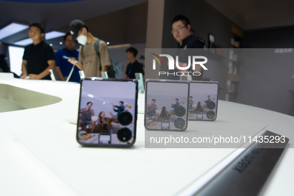 A general view of the Xiaomi Mix Fold 2 cell phone is being displayed at the Xiaomi booth during the Chinajoy games fair in Shanghai, China,...