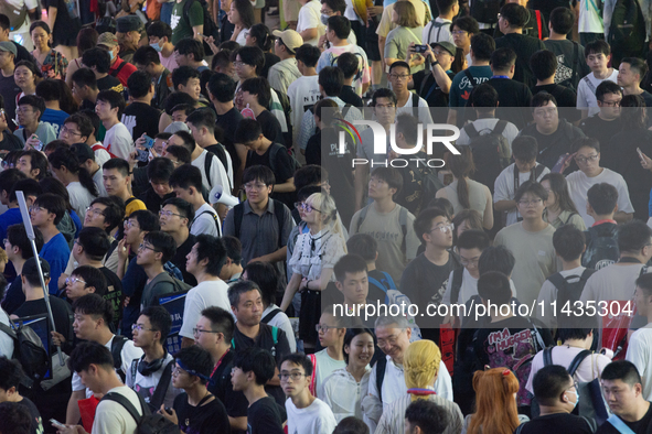 A packed crowd of fairgoers is being seen during the Chinajoy games fair in Shanghai, China, on July 26, 2024. 