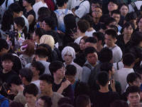 A general view of a crowd of fairgoers is being seen packed at the Chinajoy games fair in Shanghai, China, on July 26, 2024. (