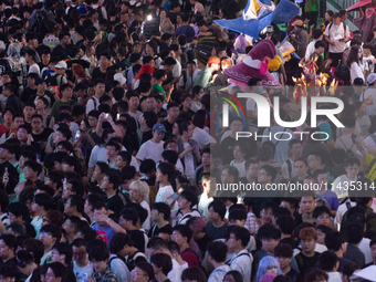 A general view of a crowd of fairgoers is being seen packed at the Chinajoy games fair in Shanghai, China, on July 26, 2024. (