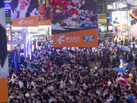 A general view of a crowd of fairgoers is being seen packed at the Chinajoy games fair in Shanghai, China, on July 26, 2024. (