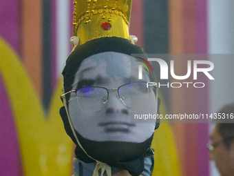 A cosplayer is posing for a picture at the Chinajoy games fair in Shanghai, China, on July 26, 2024. (