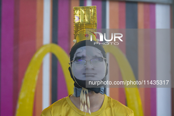 A cosplayer is posing for a picture at the Chinajoy games fair in Shanghai, China, on July 26, 2024. 