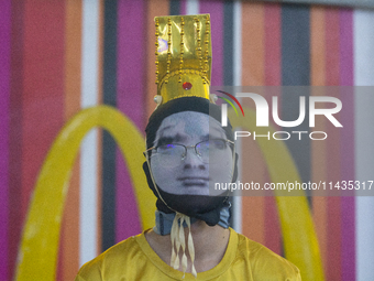 A cosplayer is posing for a picture at the Chinajoy games fair in Shanghai, China, on July 26, 2024. (