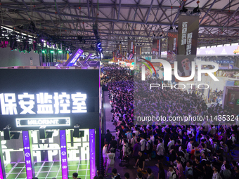 A general view of the Super Monitor Agent video game booth is being shown during the Chinajoy games fair in Shanghai, China, on July 26, 202...