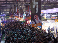 A general view of crowd fairgoers is showing them packed in front of the PlayStation booth during the Chinajoy games fair in Shanghai, China...