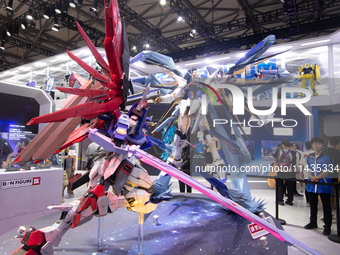 A large Gaoda model assembly action toy is being displayed at the Bandai Namco booth during the Chinajoy games fair in Shanghai, China, on J...