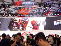 A general view of a crowd of fairgoers is being seen in front of the Netease Games booth at the Chinajoy Games Fair in Shanghai, China, on J...