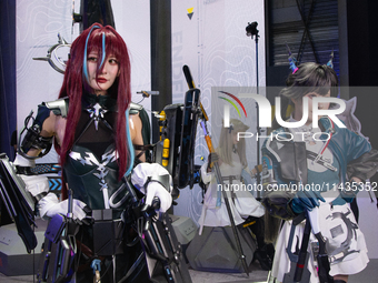 Several cosplayers are posing for a picture at the Chinajoy games fair in Shanghai, China, on July 26, 2024. (