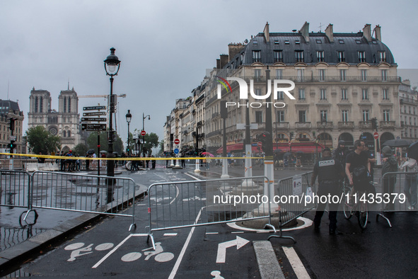 Security is operating in the center of Paris, within the no-go zone, hours before the opening ceremony of the Paris 2024 Olympic Games, in P...