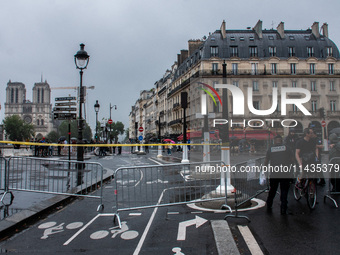 Security is operating in the center of Paris, within the no-go zone, hours before the opening ceremony of the Paris 2024 Olympic Games, in P...