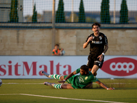 Oualid El Hasni (front) of Floriana is anticipating Joao Silva (back) of Vitoria SC to the ball during the UEFA Europa Conference League, Se...