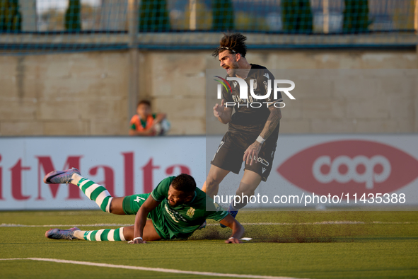 Oualid El Hasni (front) of Floriana is anticipating Joao Silva (back) of Vitoria SC to the ball during the UEFA Europa Conference League, Se...