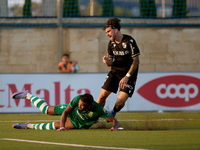 Oualid El Hasni (front) of Floriana is anticipating Joao Silva (back) of Vitoria SC to the ball during the UEFA Europa Conference League, Se...