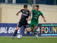 Tomas Handel (L) of Vitoria SC is moving forward with the ball ahead of Matias Garcia (R) of Floriana during the UEFA Europa Conference Leag...