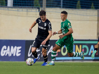 Tomas Handel (L) of Vitoria SC is moving forward with the ball ahead of Matias Garcia (R) of Floriana during the UEFA Europa Conference Leag...