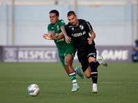 Thiago Santos of Floriana is competing for the ball with Joao Mendes of Vitoria SC during the UEFA Europa Conference League, Second Qualifyi...