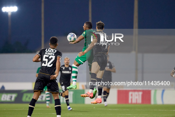 Jorge Fernandes of Vitoria SC is engaging in an aerial duel with Kemar Reid of Floriana during the UEFA Europa Conference League, Second Qua...