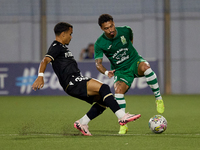 Fernandinho (right) of Floriana is being closely followed by Kaio Cesar (left) of Vitoria SC during the UEFA Europa Conference League, Secon...