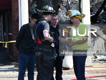 A two-alarm fire is severely damaging Zadies Kosher Bake Shop and a strip mall early Friday morning in Fair Lawn, New Jersey, United States,...