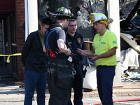 A two-alarm fire is severely damaging Zadies Kosher Bake Shop and a strip mall early Friday morning in Fair Lawn, New Jersey, United States,...