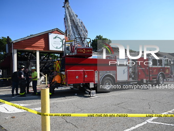 A two-alarm fire is severely damaging Zadies Kosher Bake Shop and a strip mall early Friday morning in Fair Lawn, New Jersey, United States,...