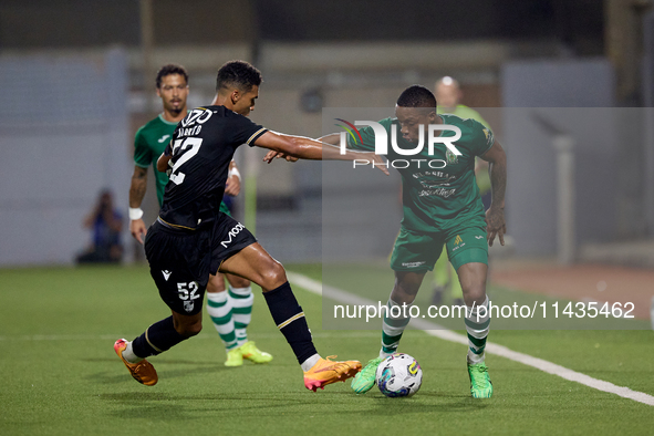 Kemar Reid (R) of Floriana is being closely followed by Baio Alberto (L) of Vitoria SC during the UEFA Europa Conference League, Second Qual...