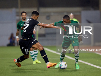 Kemar Reid (R) of Floriana is being closely followed by Baio Alberto (L) of Vitoria SC during the UEFA Europa Conference League, Second Qual...