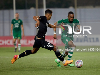 Kemar Reid (R) of Floriana is being closely followed by Baio Alberto (L) of Vitoria SC during the UEFA Europa Conference League, Second Qual...