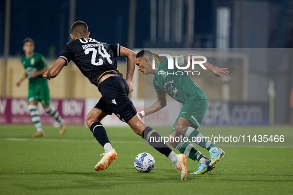 Matias Garcia of Floriana is confronting Toni Borevkovic of Vitoria SC during the UEFA Europa Conference League, Second Qualifying Round, 1s...